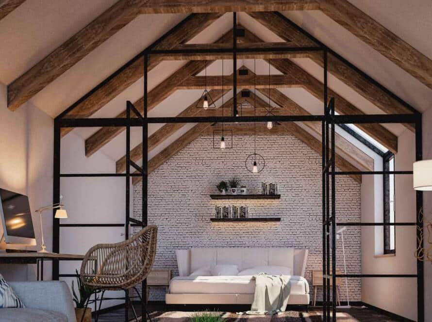 A cozy bedroom featuring a bed, a desk, and a window with visible ceiling beams.